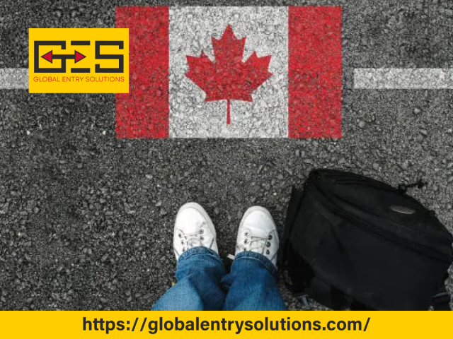 Feet standing on a road with the Canadian flag painted symbolizing the journey and process of Canada spousal sponsorship