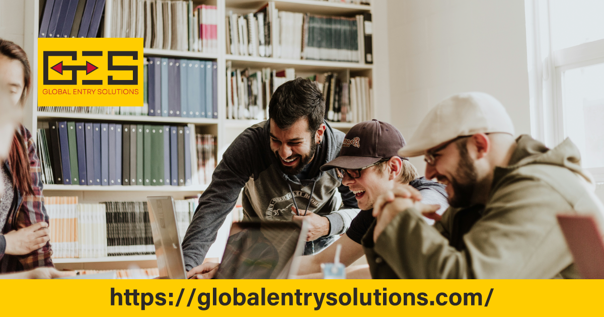 Group of postgraduate students collaborating in a library highlighting the opportunities made possible by education finance